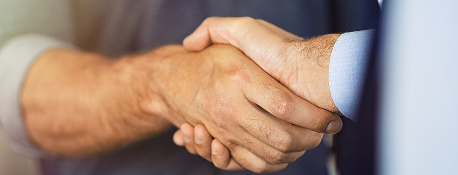 bigstock-close-up-of-friendly-handshake-343674547